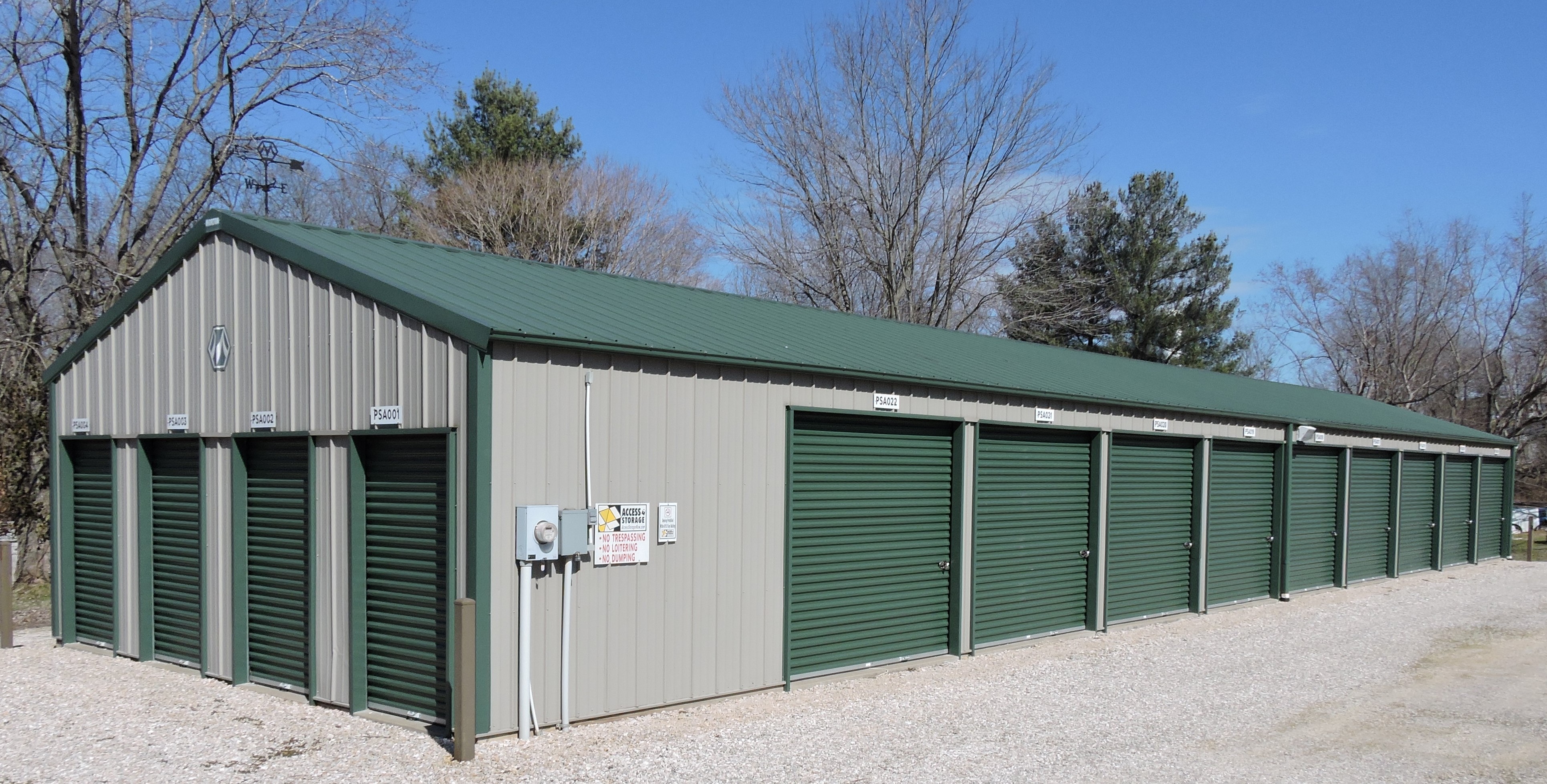 Access Storage Now in Birdseye: Drive-up storage units with distinctive green doors, available 24/7 with online payment feature.